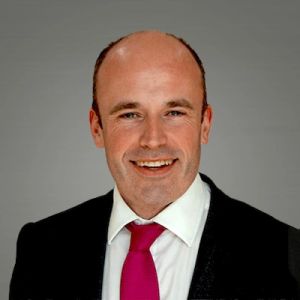 Headshot photo of Sir Jon Coles