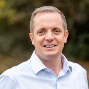 Headshot photo of James Roach