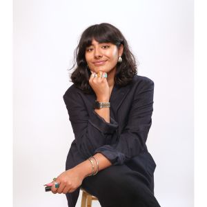 Headshot photo of Ria Kalsi