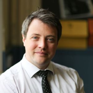 Headshot photo of Thomas 