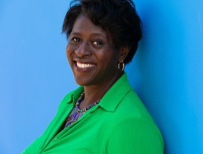 Diana Osagie provides training for senior leaders at Optimus Education's conferences.