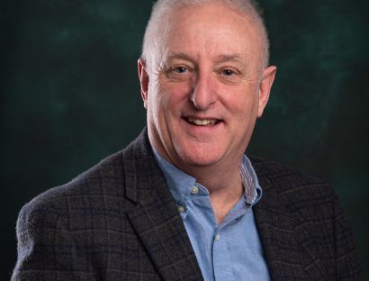 John Morris OBE speaker