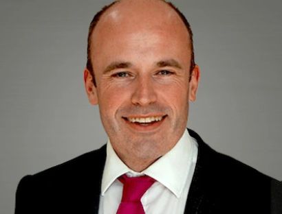 Headshot photo of Sir Jon Coles