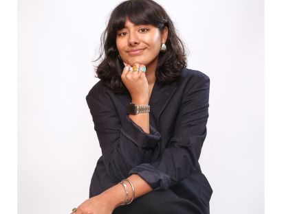 Headshot photo of Ria Kalsi