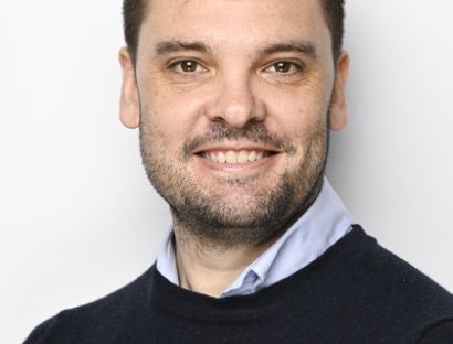 Headshot photo of Benjamin Crosby