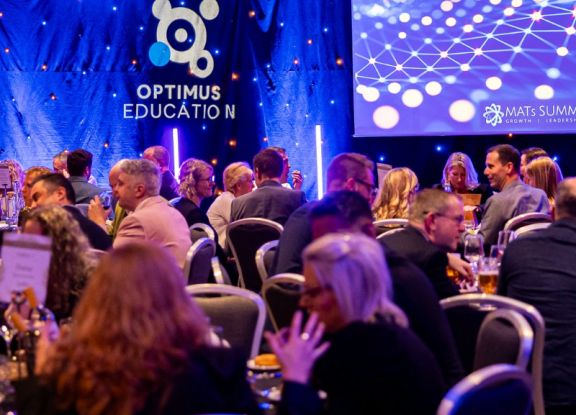 Delegates sitting at a gala dinner