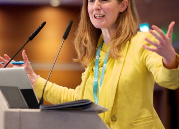 speaker at a lecturn